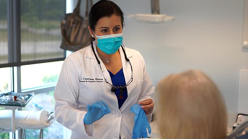 Dr. Botica explaining to patient
